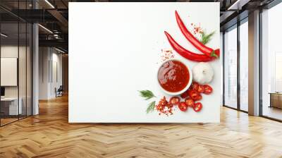 Bowl with chilli sauce, pepper and garlic on white background Wall mural