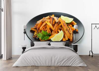 Concept of tasty food - sweet potato fries, isolated on white background Wall mural