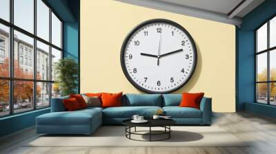 Concept of time change with clock on beige background Wall mural