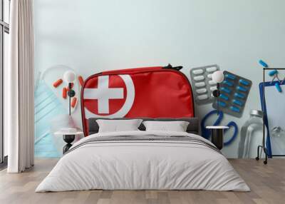 First aid medical kit on white background Wall mural