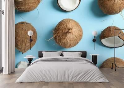 Flat lay composition with coconuts on color background Wall mural