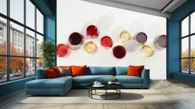 Flat lay composition. Glasses with different wine on white background, top view Wall mural