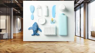 Flat lay with baby hygiene accessories on white background Wall mural