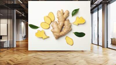 Fresh raw ginger and leaves on white background Wall mural