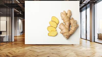 Fresh raw ginger and slices on white background Wall mural