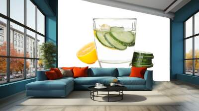 Glass with infused cucumber water isolated on white background Wall mural