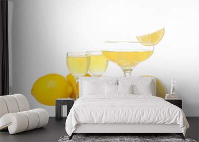 Limoncello, Italian lemon liqueur, isolated on white background Wall mural