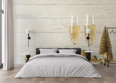 New year concept with glasses of champagne on white wooden background Wall mural