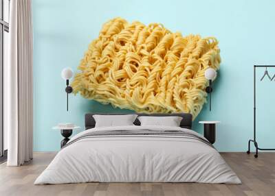 Piece of instant noodles on blue background Wall mural