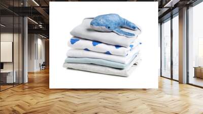 Stack of baby clothes isolated on background Wall mural