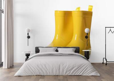 Yellow rubber boots isolated on white background Wall mural