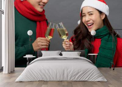 Asian couple drinking champagne celebrating Christmas Wall mural