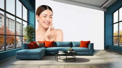 Beautiful bright skin smiling Asian woman on banner background Wall mural