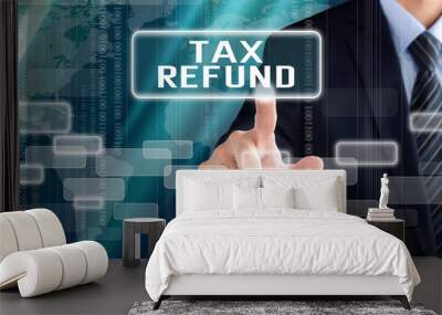 Businessman hand touching TAX REFUND sign on virtual screen Wall mural