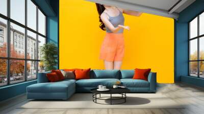 Happy young Asian woman in casual summer clothes playing beach ball Wall mural