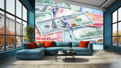 Money in multi currencies with 100 USD bill on top  Wall mural