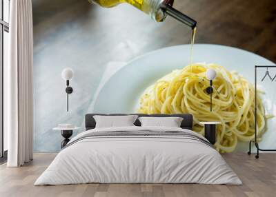 Spaghetti pasta dripped with olive oil Wall mural