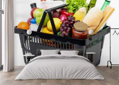 Supermarket shopping basket full of food and groceries, no background PNG file Wall mural