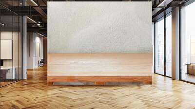 Wood table top on concrete wall background Wall mural