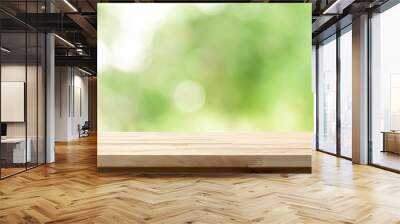 Wood table top on natural bokeh green background, panoramic banner Wall mural