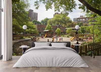 A green schoolyard with children playing in a safe, clean, and natural environment Wall mural