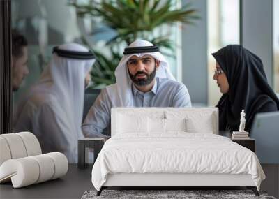 Bahraini businessman in working meeting in a modern office Wall mural