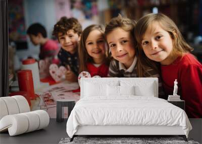 School kids happy making DIY Valentine's cards in classroom look at camera Wall mural