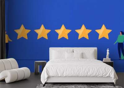 Vibrant illustration showing two people admiring five golden stars against a blue background, symbolizing excellence and high ratings. Wall mural