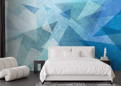 blue background with abstract geometric design with layers of triangle shapes in blue green and white colors with texture design element Wall mural