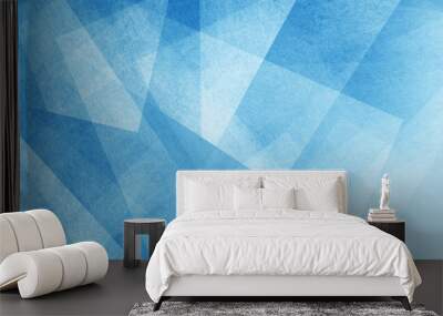 modern abstract blue background design with layers of textured white transparent material in triangle diamond and squares shapes in random geometric pattern Wall mural