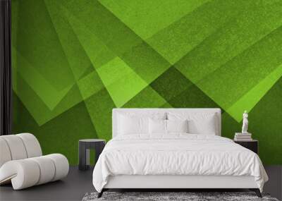 modern abstract green background design with layers of textured white transparent material in triangle diamond and squares shapes in random geometric pattern Wall mural