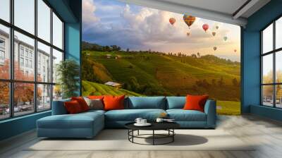 Colorful Hot Air Balloons. Aerial view Sunset scene of Pa Bong Piang terraced rice fields, Mae Chaem, Chiang Mai Thailand Wall mural