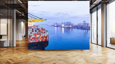 Container ship loading and unloading, Cargo freight ship for Online international order worldwide concept. Cargo containers ship. Rear view cargo container ship.	 Wall mural