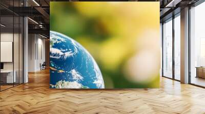 sustainable future earth globe with green leaves and sunlight background - concept of environmental conservation, carbon neutrality and climate change awareness. Wall mural