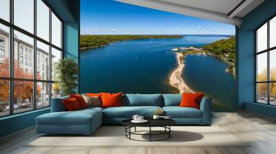 Aerial view over a large sandbar in the green waters of Oyster Bay in Lloyd Harbor on Long Island Wall mural