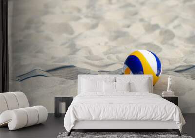 Beach volleyball ball on the sand beach. Team sport concept Wall mural