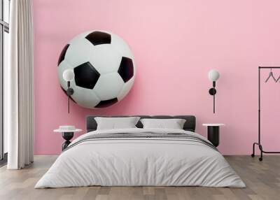 soccer ball or football on pink background Wall mural