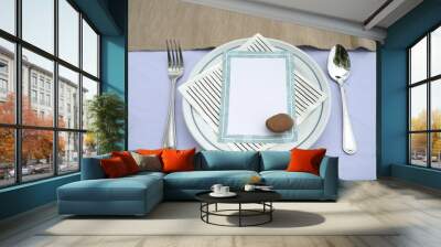 Dining set on the white table sheet with invitation paper Wall mural