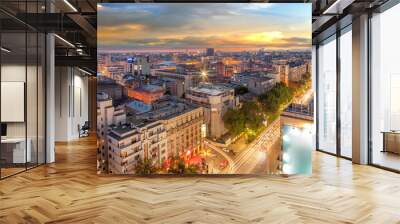 Aerial view of capital city Bucharest, Romania. University Square at sunset with traffic lights. Wall mural