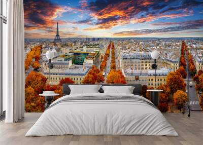 Aerial view of Paris in late autumn at sunset.Red and orange colored street trees. Eiffel Tower in the background. Paris, France Wall mural