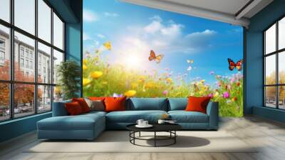 Art Beautiful blurred spring background nature with blooming glade, butterfly and blue sky on a sunny day Wall mural