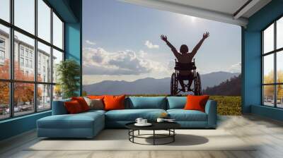 Happy disabled child in a wheelchair and stretching hands at sunset. back view, Wall mural