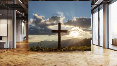 Silhouette cross on mountain at sunset background.Crucifixion Of Jesus Christ Wall mural