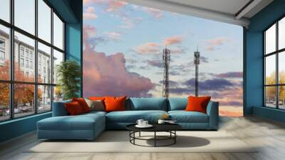 Telecommunication tower on top of the mountain whit colorful sky at sunset time. Wall mural