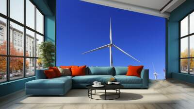 Wind turbine and white cloud in the blue sky. Wall mural