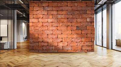 Red brick wall with shining light for background. Wall mural