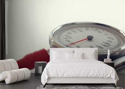 A close-up of a blood pressure gauge, used for measuring blood pressure. Wall mural