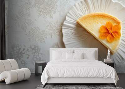 Slice of Cheesecake with Orange Flower on White Plate. Wall mural