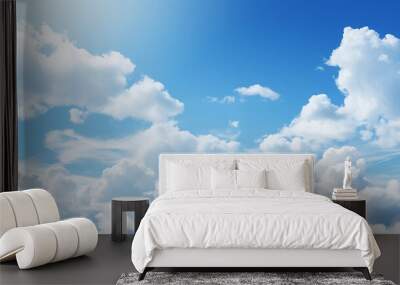 fantastic soft white clouds against blue sky background with sun bright Wall mural