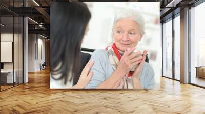 doctor chatting to an old lady Wall mural